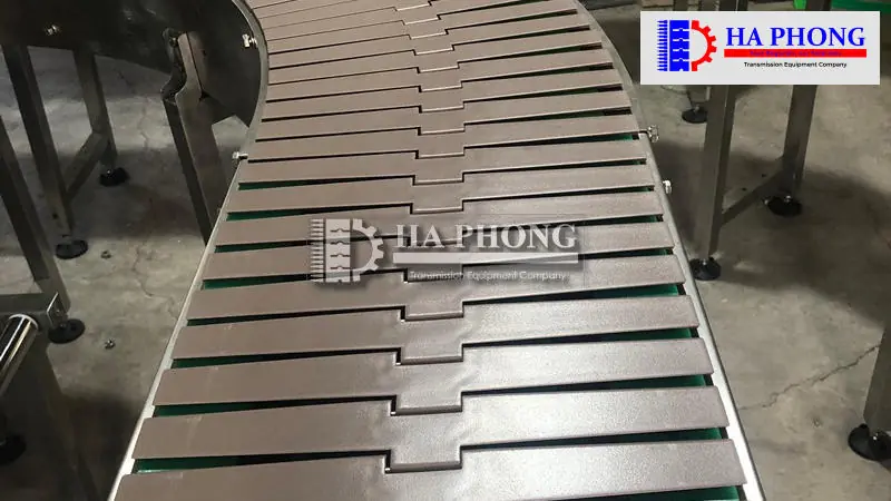 Tìm hiểu về băng tải xích - Cấu tạo, phân loại và ứng dụng Băng tải xích là gì?
