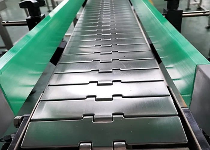 Tìm hiểu về băng tải xích - Cấu tạo, phân loại và ứng dụng Băng tải xích tấm
