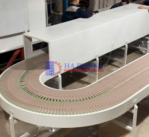Băng tải cong là gì? Phân loại, cấu tạo và ứng dụng mới nhất